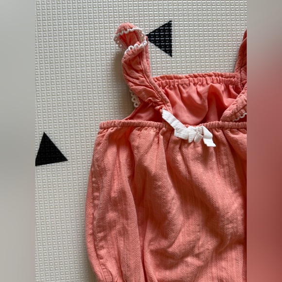 Dylan & Abby|Baby girl summer coral bubble romper with cute bow•••12 months - Picture 2 of 4
